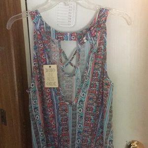 Romper Brand new. Junior L size